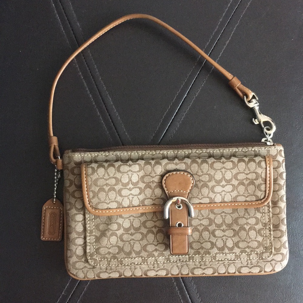 Like new condition, Coach Soho mini wristlet.